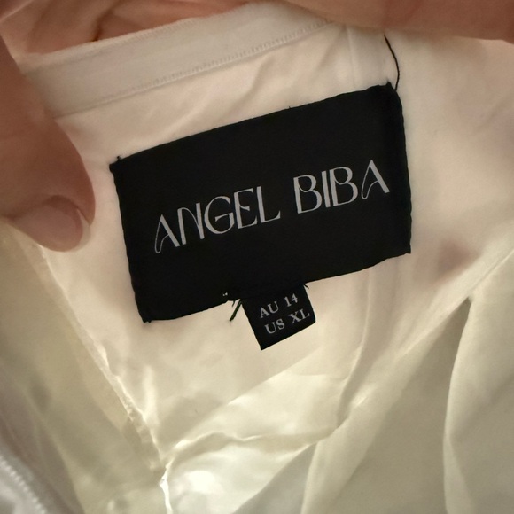 Showpo
RHEIVA MIDI DRESS - STRAPLESS 3D EMBROIDERY MIDI DRESS IN WHITE - Picture 4 of 5